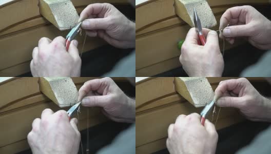 男人用钳子手工制作珠宝高清在线视频素材下载
