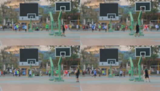 一群朋友在公园里打篮球。高清在线视频素材下载