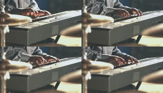 黑人弹奏电子键盘的镜头高清在线视频素材下载