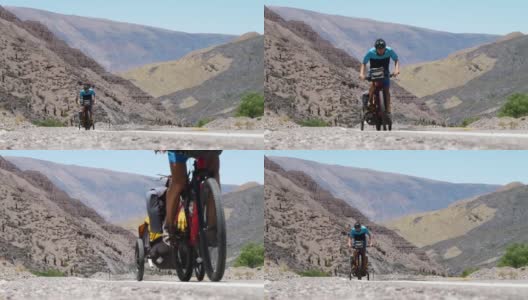 骑着带拖车的自行车的人在安第斯山脉克服了一个困难的关口高清在线视频素材下载