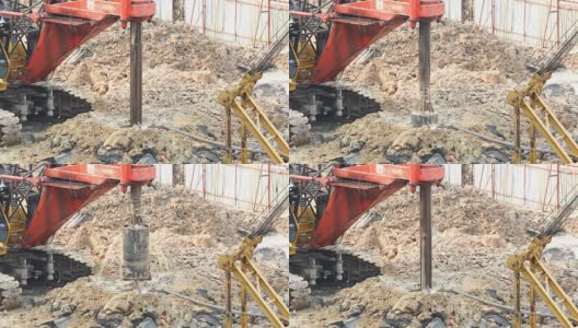 Caterpillar machine dig hole for piling高清在线视频素材下载