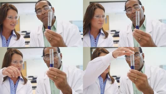男性和女性科学家在试管中分析液体高清在线视频素材下载
