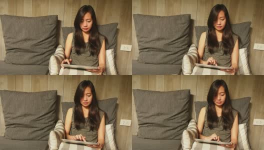 亚洲女性放松使用平板电脑高清在线视频素材下载
