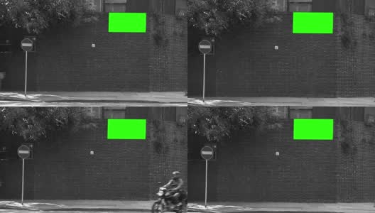 空白广告牌或广告牌与绿色屏幕的砖墙上的房子在阿根廷。黑白色调。高清在线视频素材下载
