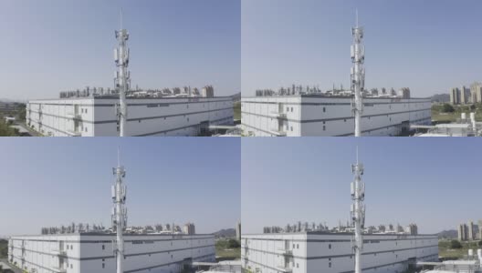 在现代城市位置的5G塔高清在线视频素材下载