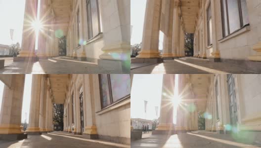 美丽的列。相机运动。高层建筑。太阳射线。缓慢的运动。乌克兰。基辅，11.07.18公园VDNH高清在线视频素材下载