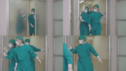 医院急诊医生队伍步行通过急诊室门高清在线视频素材下载