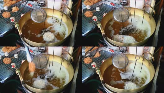油炸泰国传统的花形甜品Kanom dochok或Pistia花糖果的镜头高清在线视频素材下载