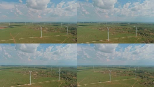 德克萨斯州丘陵地带的风力生态能源涡轮机高清在线视频素材下载
