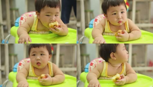 亚洲可爱宝宝吃苹果高清在线视频素材下载