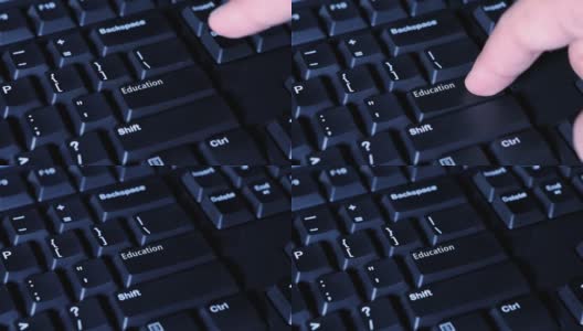 一个男性手指按下计算机键盘上的“教育”按钮的微距视频片段高清在线视频素材下载