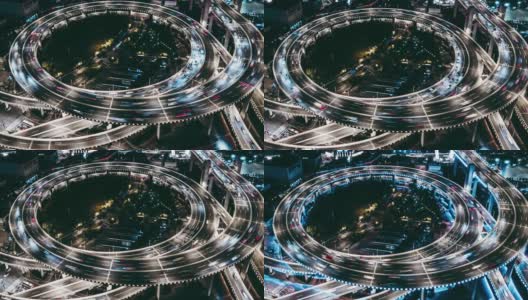 T/L TU无人机视角的立交桥和城市交通在夜间高清在线视频素材下载