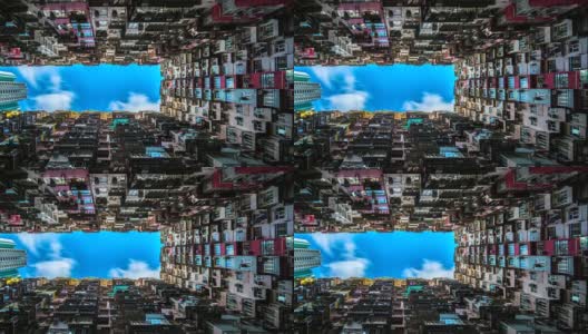 4k时间流逝电影移动云低角度拍摄香港鲗鱼涌一个老社区拥挤的住宅大厦高清在线视频素材下载