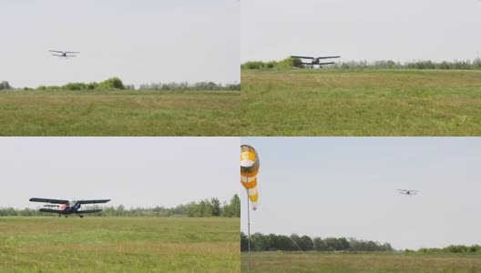 轻型单引擎飞机降落在机场。飞机停在绿色的草地上高清在线视频素材下载