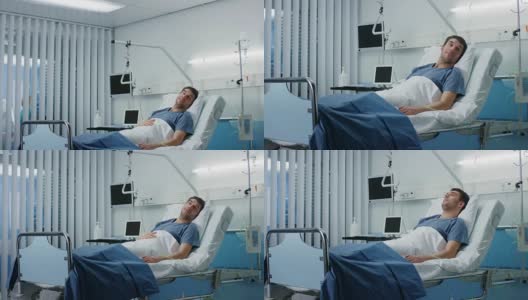 男病人躺在医院的病床上。干净平静的临床病房。高清在线视频素材下载