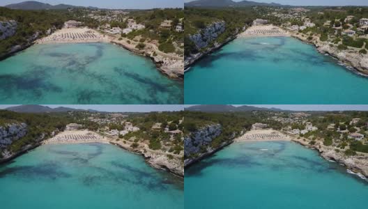 西班牙马略卡岛，克里斯托港，浪漫卡拉岛，美丽的卡拉埃斯塔尼德恩马斯湾的无人机航拍景观高清在线视频素材下载