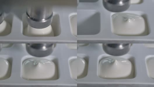 酸奶油浇注过程的详细视图。高清在线视频素材下载