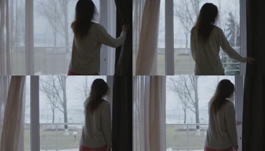 年轻女子早上打开门，走到阳台高清在线视频素材下载