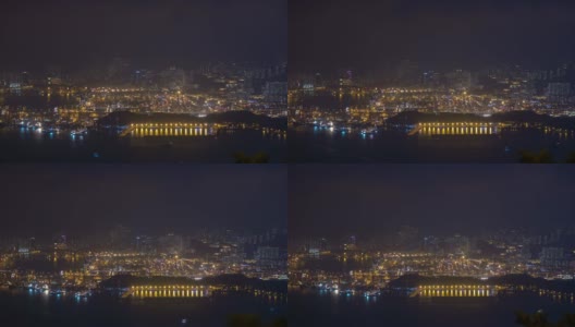 夜晚照亮香港城市港口山顶全景4k时间推移高清在线视频素材下载