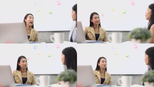 在办公室里说话的亚洲商业女性高清在线视频素材下载