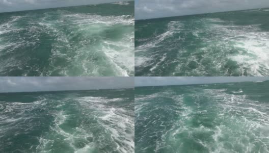 巨浪和巨浪上的白浪。暴风雨的绿色海洋高清在线视频素材下载