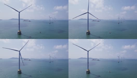 天空晴朗，海上有风力发电厂高清在线视频素材下载