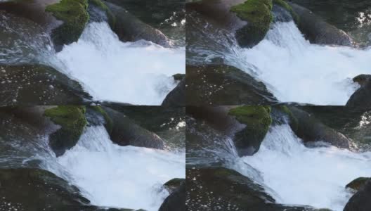 特写和慢动作的河流。水从石头上流过高清在线视频素材下载