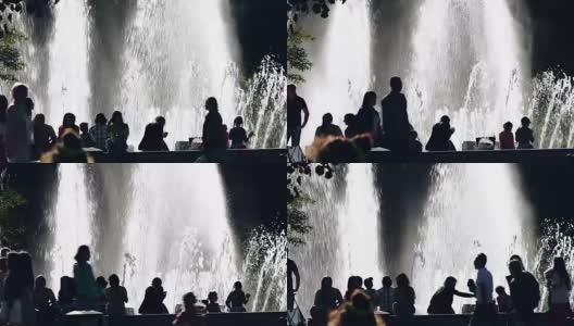人们在喷泉附近的公园里高清在线视频素材下载