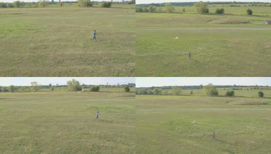 小男孩带着风筝在田野里奔跑高清在线视频素材下载