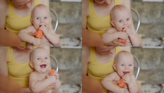 小男孩嚼着一根橙色的胡萝卜高清在线视频素材下载
