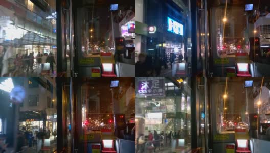 有轨电车里的香港夜市街景高清在线视频素材下载