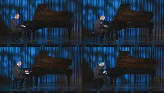 高清多莉:在音乐厅演奏的男钢琴家高清在线视频素材下载