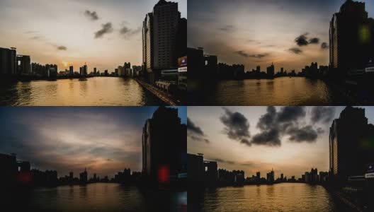 中国广州，2014年11月23日:日落时分珠江河畔的现代建筑，中国广州高清在线视频素材下载