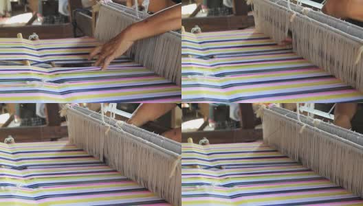 在泰国织布机上织布的妇女高清在线视频素材下载