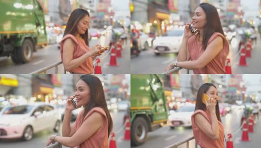 在泰国曼谷的夜市，一名4K亚洲妇女在使用智能手机旅行高清在线视频素材下载