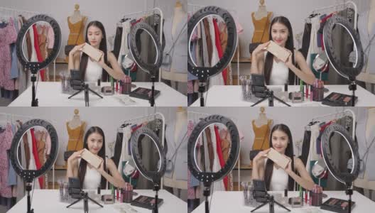 肖像视频的年轻亚洲妇女准备在家里在线销售产品的实时流高清在线视频素材下载