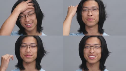 英俊快乐的年轻亚洲人摸他的头发高清在线视频素材下载