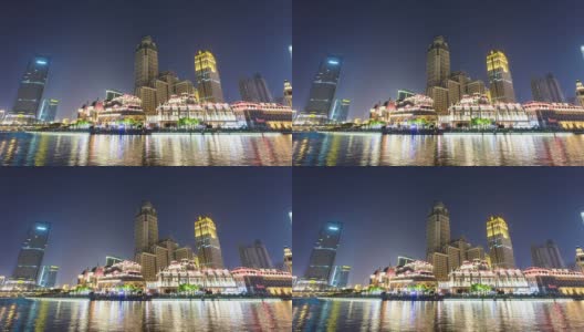 夜深人静，天津的天际线和现代建筑在河岸上，瞬间消失。高清在线视频素材下载