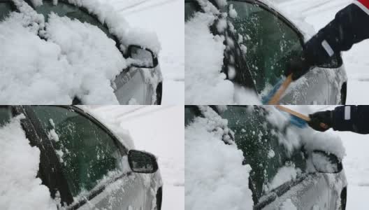 清除车窗上积雪的人高清在线视频素材下载