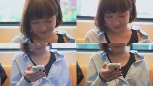 特写女子在火车上使用智能手机高清在线视频素材下载