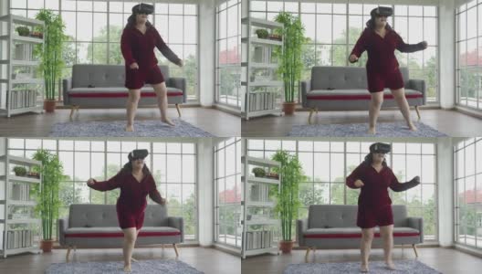 亚洲大码女性戴着vr眼镜在网上跳舞锻炼，元未来互联网概念高清在线视频素材下载