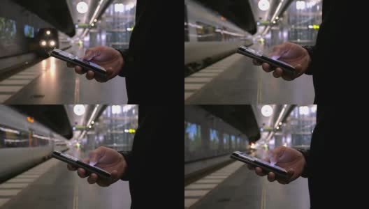 用手机等火车的男人高清在线视频素材下载
