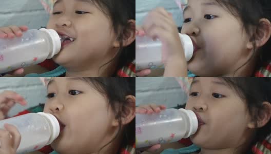 孩子吸奶瓶高清在线视频素材下载