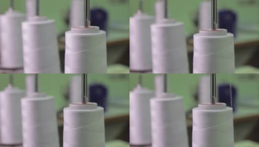 纺织厂织布机上的线轴。近距离高清在线视频素材下载