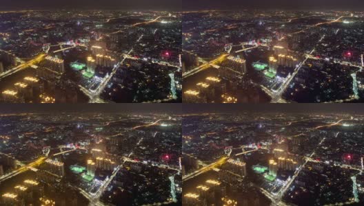 全景鸟瞰图的天际线，建筑物和交通在晚上在广州，时间推移。高清在线视频素材下载