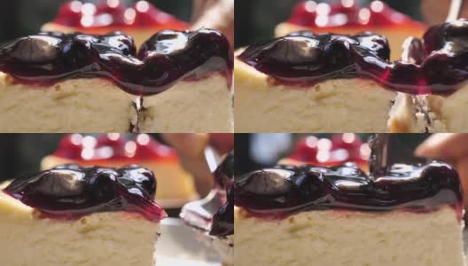 靠近蓝莓奶酪蛋糕与服务和切蛋糕高清在线视频素材下载