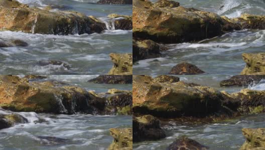 9 .慢镜头中，海浪拍打着黑海的石滩高清在线视频素材下载