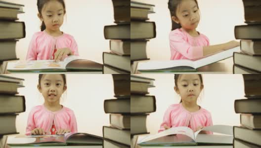 亚洲小女孩在读她的书高清在线视频素材下载