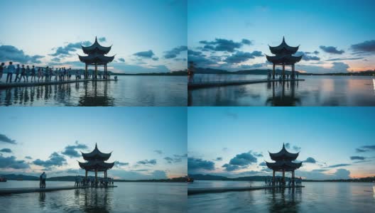 日落时分，杭州西湖上的天空和亭子。时间流逝。高清在线视频素材下载