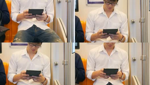 年轻人在火车上使用平板电脑高清在线视频素材下载